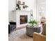 Cozy living room displays a fireplace, stylish furniture, and a contemporary design at 360 Beracah Sw Trl, Atlanta, GA 30331