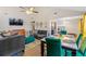 Spacious open-concept living room and dining area, filled with natural light and stylish furnishings at 4657 Tartan Ct, Union City, GA 30291