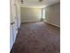 Spacious bedroom featuring a large window and neutral-toned walls, creating a blank canvas at 8302 N Sterling Lakes Dr, Covington, GA 30014