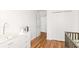 Bedroom with a white dresser, changing table, closet and view to the room at 1688 Jackson Sq, Atlanta, GA 30318