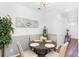 Cozy dining area featuring an elegant chandelier and flower painting at 1688 Jackson Sq, Atlanta, GA 30318