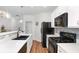 Well-equipped kitchen with stainless steel appliances, quartz countertops, and ample cabinetry at 1688 Jackson Sq, Atlanta, GA 30318