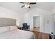 Comfortable bedroom featuring a vaulted ceiling, bed, and a door leading to another room at 1688 Jackson Sq, Atlanta, GA 30318