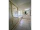Bright bathroom with large soaking tub, a glass-enclosed shower, and double sink vanity at 1770 Bethany Spring, Cumming, GA 30041