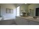 Bright bathroom with double sinks, framed mirrors, soaking tub and natural light at 1770 Bethany Spring, Cumming, GA 30041