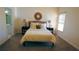 Cozy bedroom with a queen-sized bed, nightstands, and a sunny window at 1770 Bethany Spring, Cumming, GA 30041