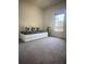 Bright bedroom with a daybed, pillows and a large window for natural light at 1770 Bethany Spring, Cumming, GA 30041