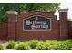 Elegant brick entrance to Bethany Spring neighborhood with lush green landscaping at 1770 Bethany Spring, Cumming, GA 30041