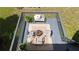 This elevated deck provides a lounge area with stylish furniture and a view of the yard at 1770 Bethany Spring, Cumming, GA 30041