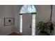 Bright entryway featuring a white front door, complemented by natural light and stylish decor at 1770 Bethany Spring, Cumming, GA 30041