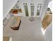 Aerial view of modern kitchen with granite countertops and a central island with a cooktop at 5004 Barnwood Nw Ter, Kennesaw, GA 30152