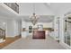 Open kitchen features granite counters, stainless appliances, and center island with seating at 5004 Barnwood Nw Ter, Kennesaw, GA 30152
