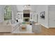 Cozy living room with stylish furnishings, a fireplace, and elegant decor at 5004 Barnwood Nw Ter, Kennesaw, GA 30152