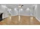 Spacious main bedroom featuring a fireplace, tray ceilings, and hardwood floors at 5004 Barnwood Nw Ter, Kennesaw, GA 30152
