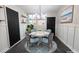 Charming dining room with modern lighting and seating for four at 600 Bedfort Dr, Duluth, GA 30096