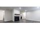 Bright and open living room with fireplace, and wood floors at 600 Bedfort Dr, Duluth, GA 30096