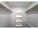 Walk in closet with built-in shelving for plenty of storage at 600 Bedfort Dr, Duluth, GA 30096