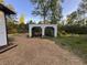 Backyard featuring a wooden structure and open space, perfect for outdoor activities at 7817 Mattie Mccoy Ln, Winston, GA 30187