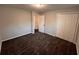 Bedroom showcasing new carpet and closet space at 7817 Mattie Mccoy Ln, Winston, GA 30187