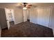 Bedroom features closet space and access to the renovated bathroom at 7817 Mattie Mccoy Ln, Winston, GA 30187