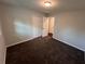 Standard bedroom showcasing carpet and closet at 7817 Mattie Mccoy Ln, Winston, GA 30187