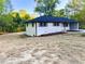 Inviting ranch-style home with fresh updates and landscaping, set back on a spacious, well-manicured lawn at 7817 Mattie Mccoy Ln, Winston, GA 30187
