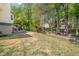 Large backyard with mature trees and garden at 1165 Evergreen Oak Way, Dacula, GA 30019
