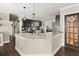 Modern kitchen with stainless steel appliances and granite countertops at 1165 Evergreen Oak Way, Dacula, GA 30019
