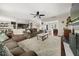 Open floorplan featuring the kitchen and living room with hardwood flooring and neutral colors at 1165 Evergreen Oak Way, Dacula, GA 30019