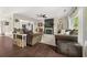 Living room with hardwood flooring, a fireplace, and plenty of natural light at 1165 Evergreen Oak Way, Dacula, GA 30019