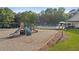 Community playground with slide, climbing equipment, and a view of the pool at 1165 Evergreen Oak Way, Dacula, GA 30019