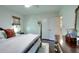 Bedroom with a four-poster bed, closet and hardwood floors at 1531 Cooper Lake Se Rd, Smyrna, GA 30082