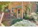 Back exterior view with brick facade and a fenced yard at 1531 Cooper Lake Se Rd, Smyrna, GA 30082