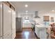 Bright kitchen featuring stainless steel appliances, white cabinets, and an island with seating at 1531 Cooper Lake Se Rd, Smyrna, GA 30082