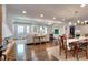 Open concept living room and dining area featuring hardwood floors and neutral decor at 1531 Cooper Lake Se Rd, Smyrna, GA 30082
