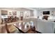 Open concept living room, dining room featuring wood floors and neutral decor at 1531 Cooper Lake Se Rd, Smyrna, GA 30082