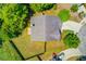 Aerial view of the home's backyard and patio area, showcasing its design and location at 1691 Scenic Pines Dr, Lawrenceville, GA 30044