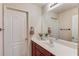 Bathroom vanity with modern fixtures, a sink, and a large mirror offering ample space at 1691 Scenic Pines Dr, Lawrenceville, GA 30044