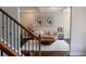 Cozy living room showcasing a tufted sofa, wood floors, coffered ceilings, and stylish decor at 4685 Columbia St, Cumming, GA 30040