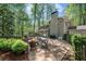 Inviting backyard patio with a fire pit and seating, ideal for outdoor gatherings at 965 River Overlook Ct, Sandy Springs, GA 30328
