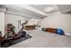 Spacious basement with workout area and room for games, great for entertainment and fitness at 965 River Overlook Ct, Sandy Springs, GA 30328
