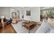 Cozy living area with hardwood flooring, comfortable seating, and an open layout at 965 River Overlook Ct, Sandy Springs, GA 30328