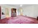 Vintage bedroom featuring an attached bathroom and a closet at 1496 Country Squire Dr, Decatur, GA 30033