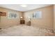 Cozy bedroom featuring two windows at 1496 Country Squire Dr, Decatur, GA 30033