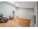 Bright living room with hardwood floors, skylights, a fireplace and ample natural light at 1496 Country Squire Dr, Decatur, GA 30033