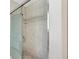 Bathroom tile shower with glass doors at 1496 Country Squire Dr, Decatur, GA 30033
