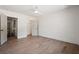 Spacious bedroom with hardwood floors and a closet, showcasing ample storage at 1995 Mcafee Rd, Decatur, GA 30032