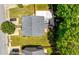 Aerial view of townhome with fenced backyard and lush green surroundings at 625 Outlook Way, Atlanta, GA 30349