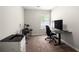 Bright bedroom featuring neutral walls, carpeted flooring, and a window providing natural light at 625 Outlook Way, Atlanta, GA 30349