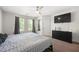 This bedroom features a ceiling fan, television, and a dresser at 625 Outlook Way, Atlanta, GA 30349